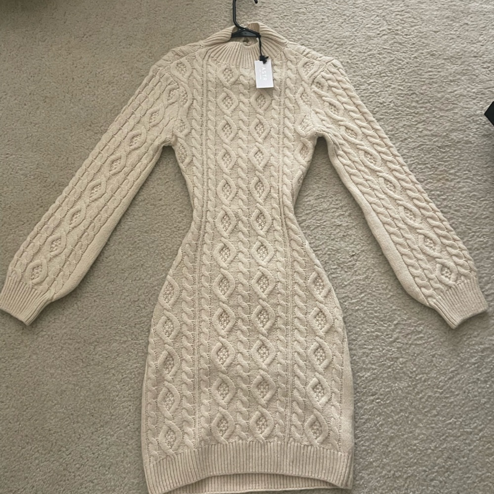 Never worn sweater dress size small open back